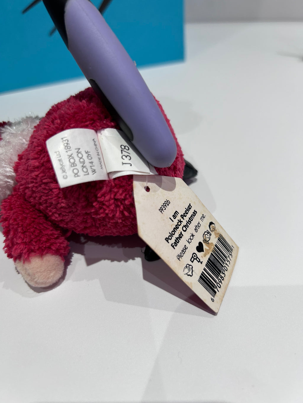 Jellycat Poloneck Peeker Father Christmas